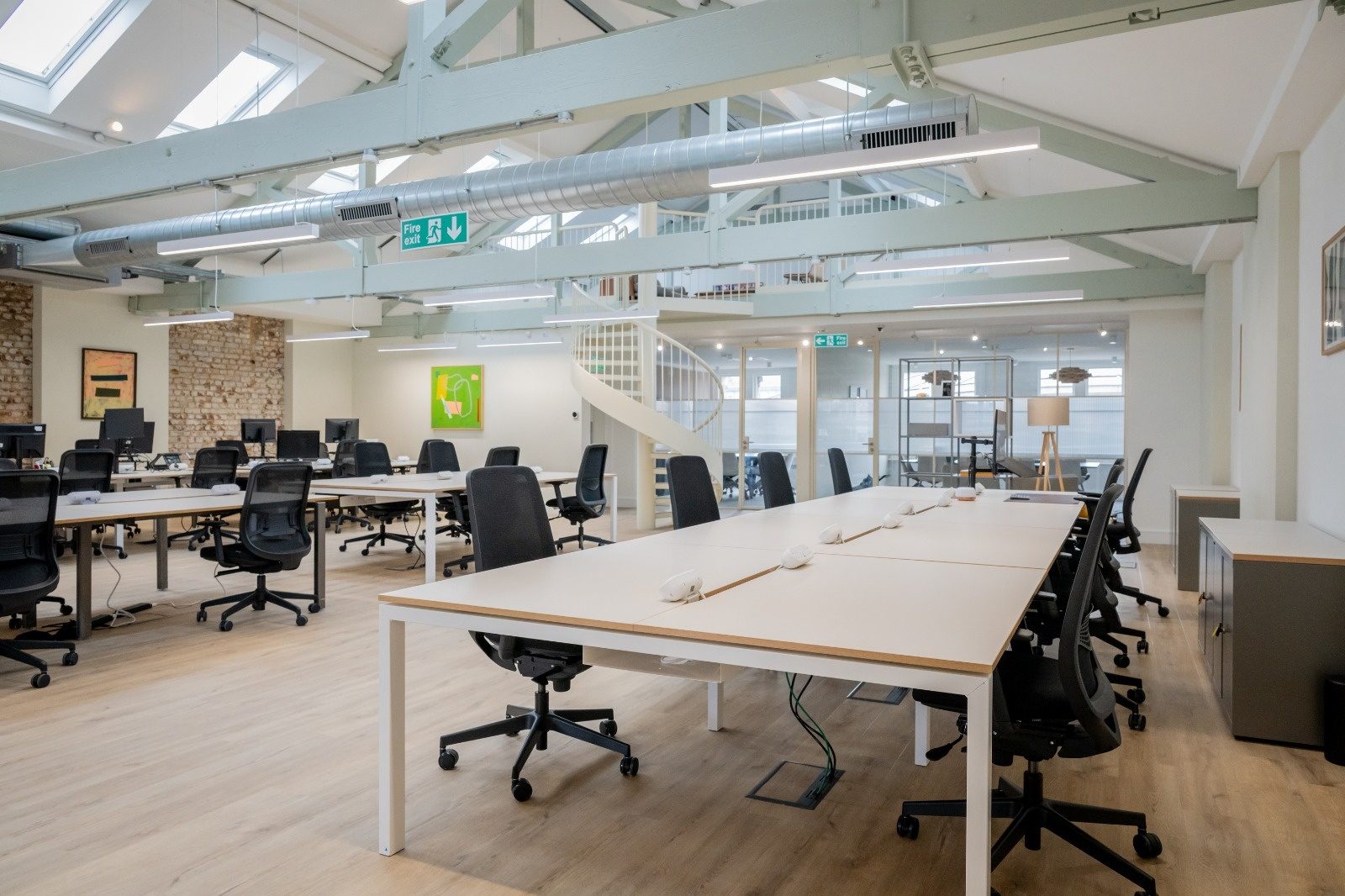 Commercial electrical fit-out of an open-plan office in Loughton with suspended linear lighting and small power to every desk