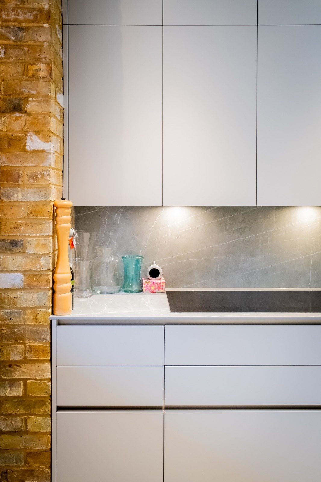 Under-cabinet kitchen lighting installed on a controllable smart lighting circuit